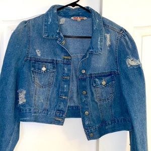 Destroyed denim jacket
